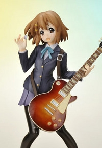 My first real figurine, Yui Hirasawa from K-ON! Puts a smile on my